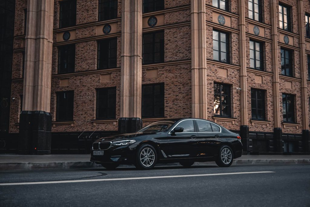 remap fife 10 black bmw sedan brick building