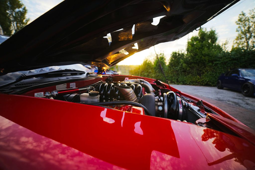remap fife 6 open hood of red car